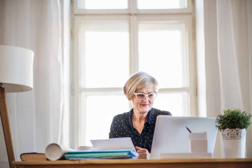 senior woman working from home 